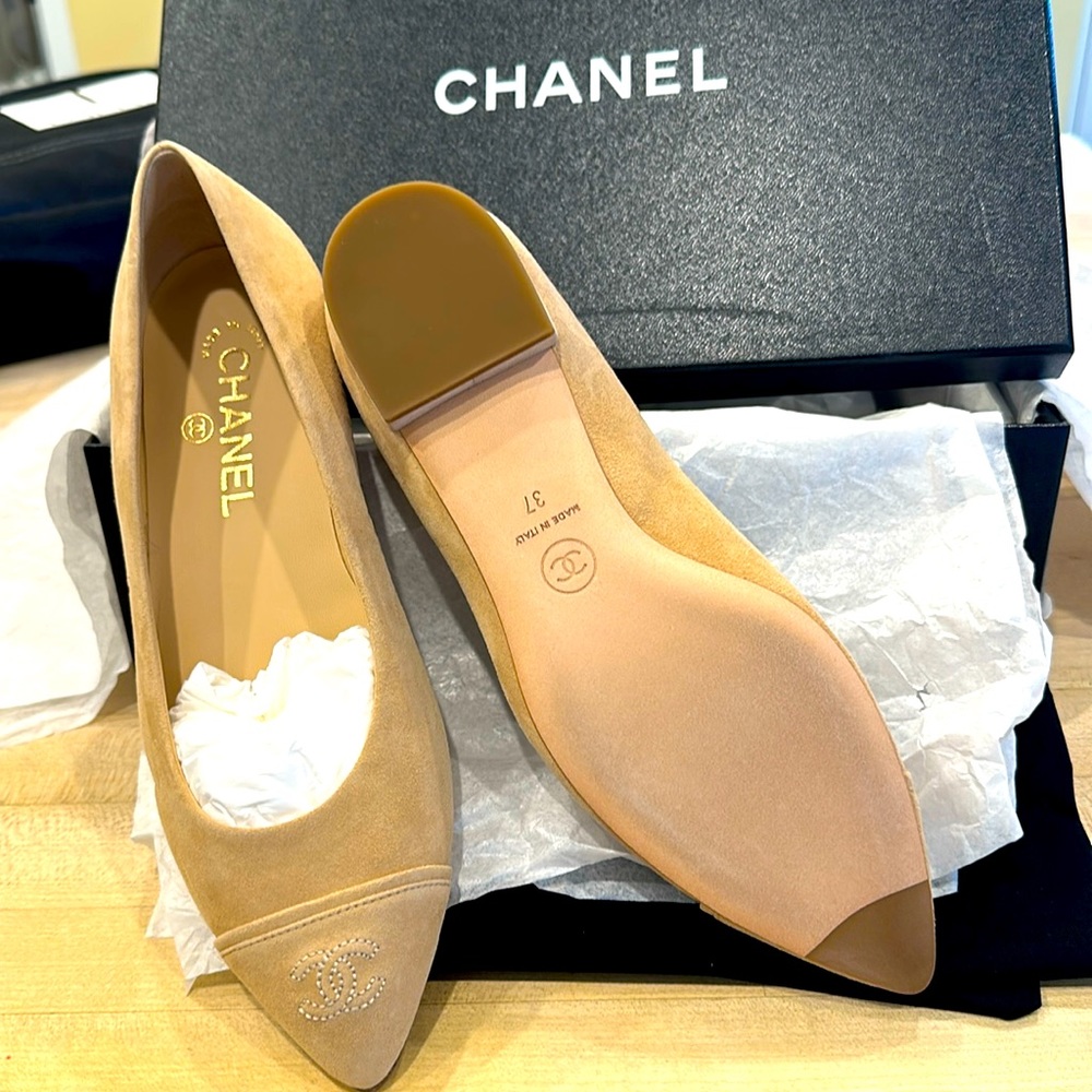 New — never worn CHANEL ballet flat in tan suede.
